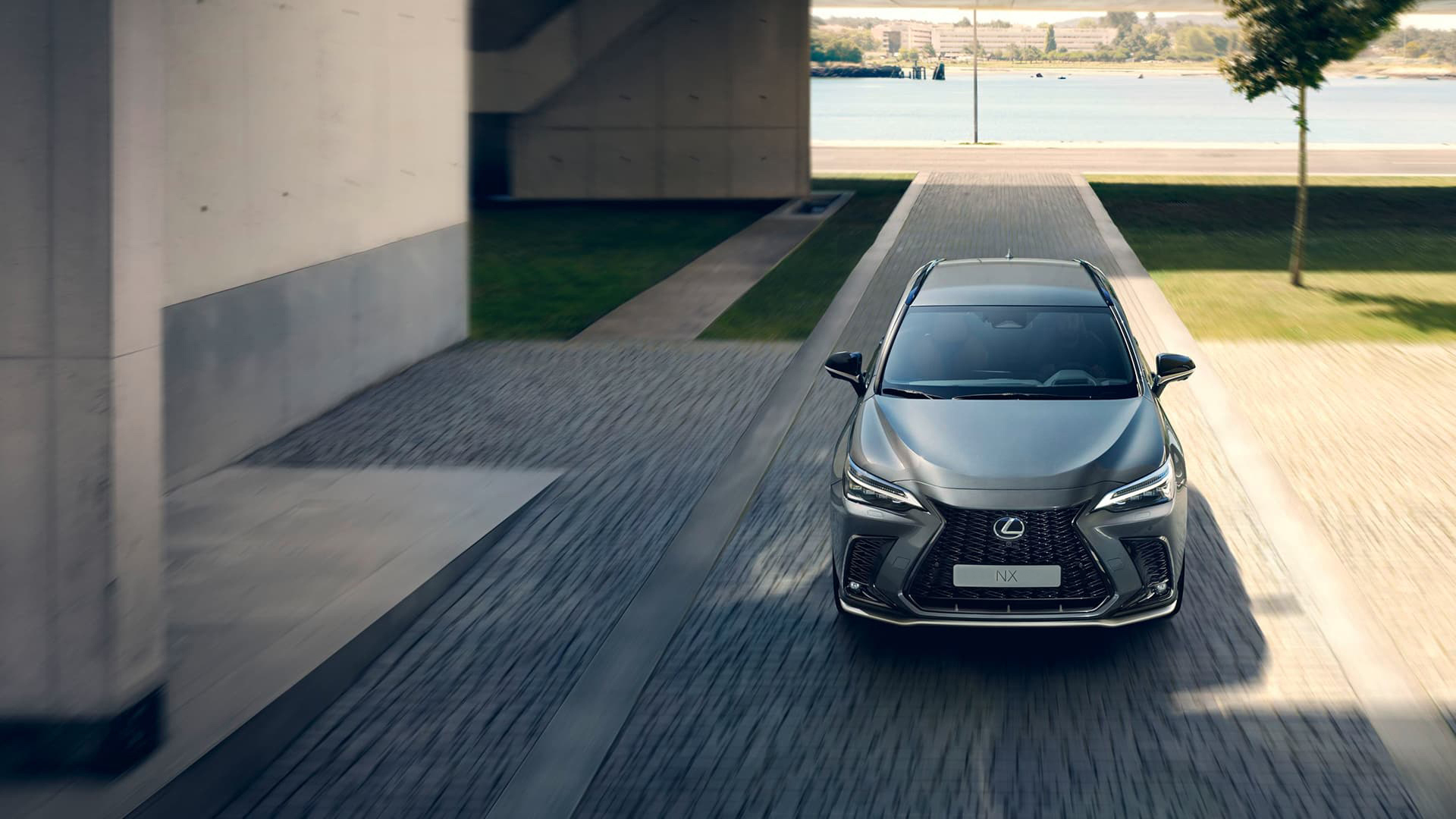 Group of friends charging a white NX.