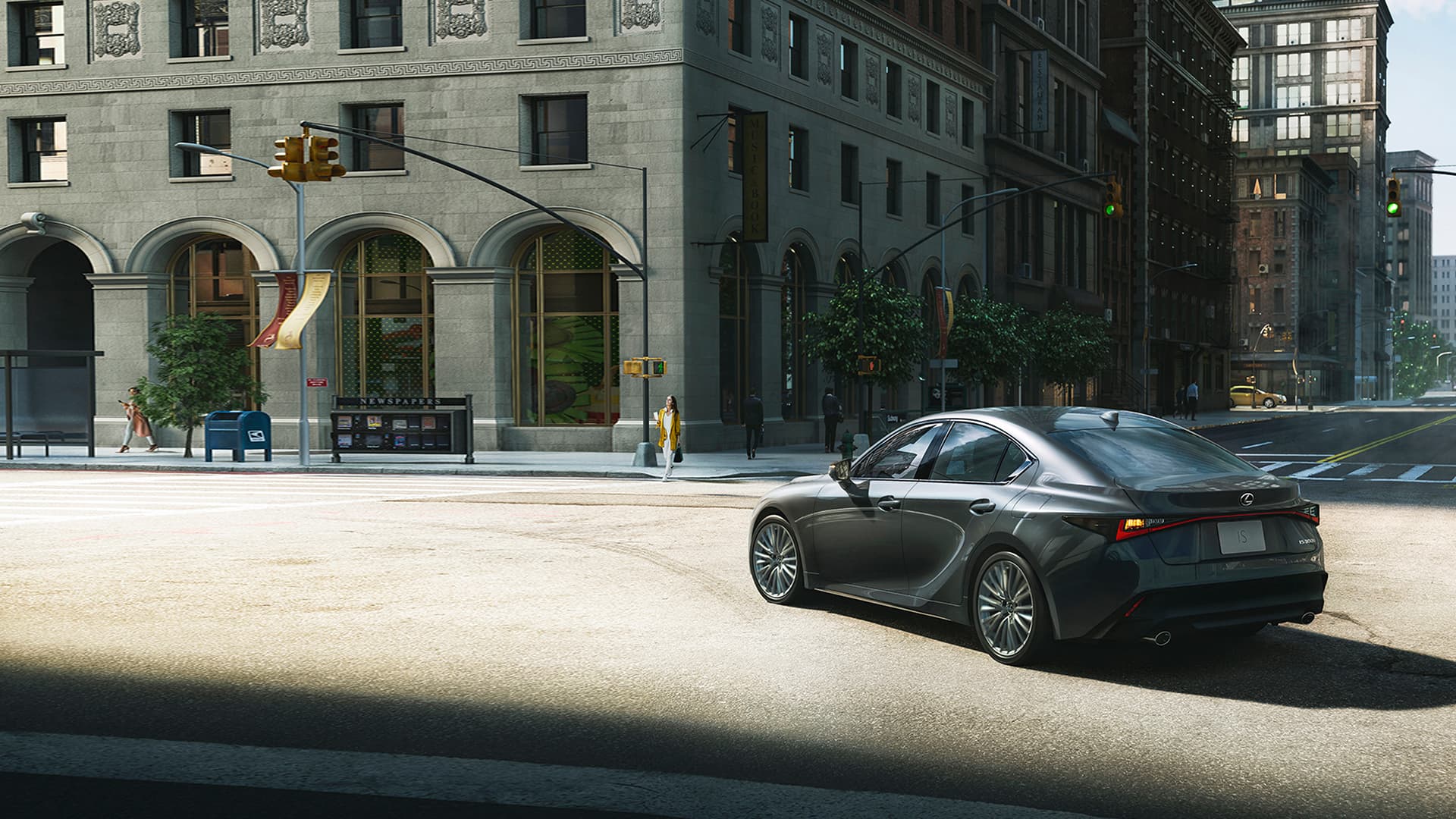 Silver Lexus IS being driven in a city.